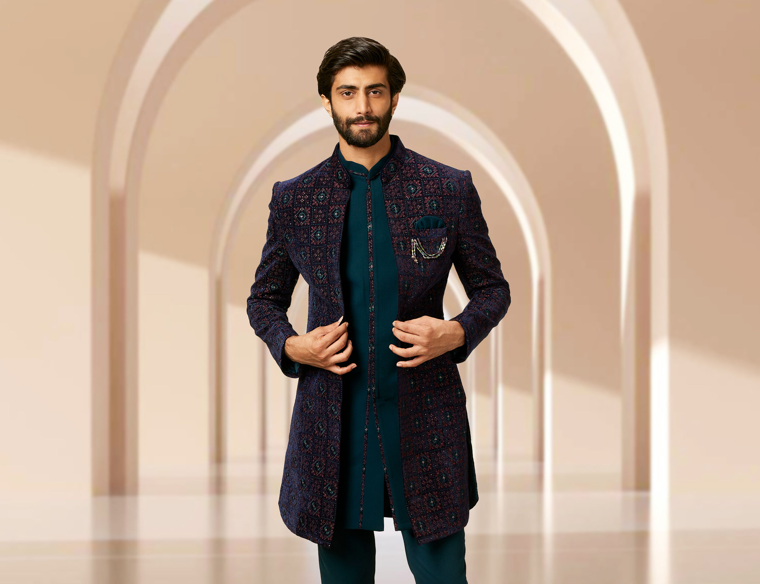 A groom wearing elegant indo western wedding oufit